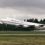 The transport version of Boeing 747, as shown above, after modifications, was envisioned to carry up to 10 Model 985 microfighters inside a dorsal hangar structure.